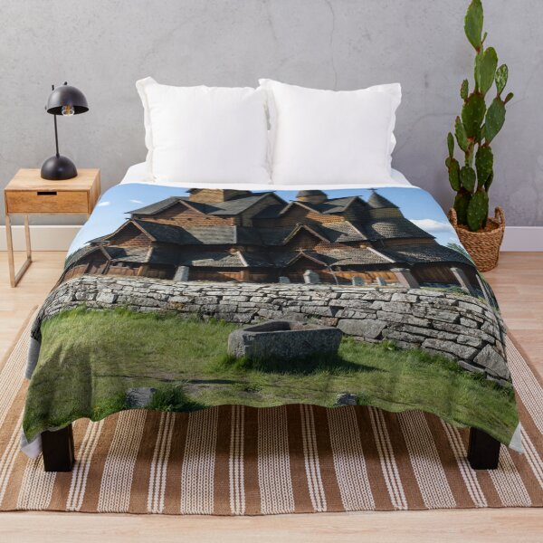 Item preview, Medieval graveyard and Heddal wooden stave church. Heddal Stavkirke, 13th century. Largest stave church in Norway. Sunny spring day (vertical) designed and sold by Maurizio Fabbroni.