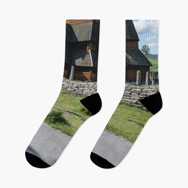 Item preview, Medieval graveyard and Heddal wooden stave church. Heddal Stavkirke, 13th century. Largest stave church in Norway. Sunny spring day (vertical) designed and sold by Maurizio Fabbroni.