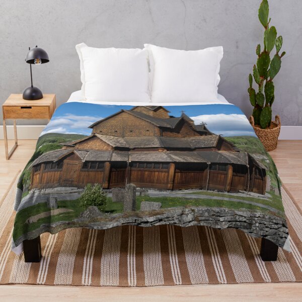 Item preview, Medieval graveyard and Heddal wooden stave church. Heddal Stavkirke, 13th century. Largest stave church in Norway. Sunny spring day (vertical) designed and sold by Maurizio Fabbroni.