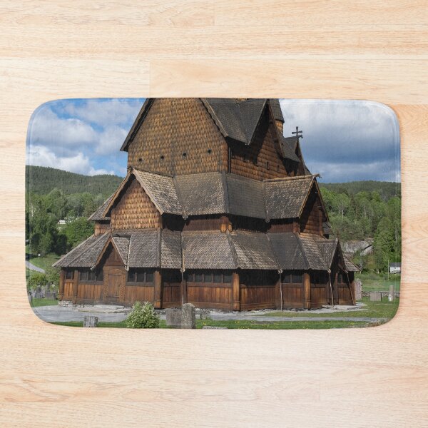 Item preview, Medieval graveyard and Heddal wooden stave church. Heddal Stavkirke, 13th century. Largest stave church in Norway. Sunny spring day (vertical) designed and sold by Maurizio Fabbroni.