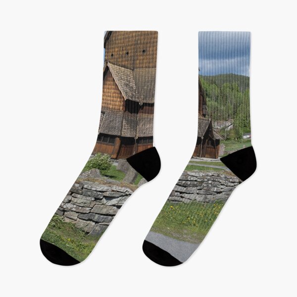 Item preview, Medieval graveyard and Heddal wooden stave church. Heddal Stavkirke, 13th century. Largest stave church in Norway. Sunny spring day (vertical) designed and sold by Maurizio Fabbroni.