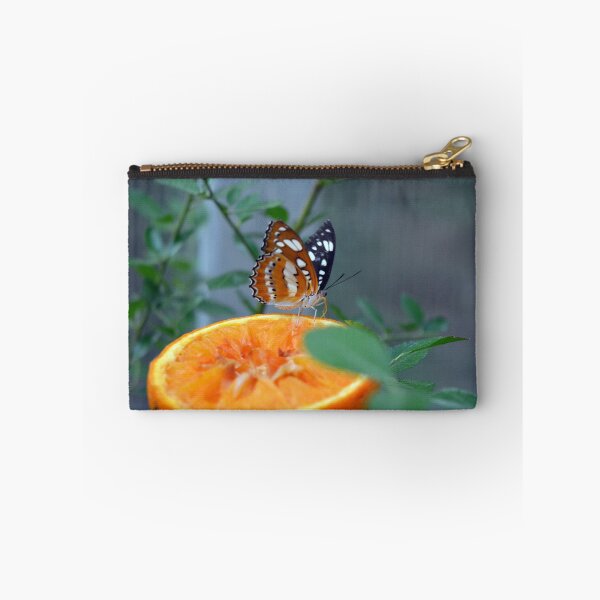 Item preview, Colorful orange butterfly on slice of orange  designed and sold by oanaunciuleanu.