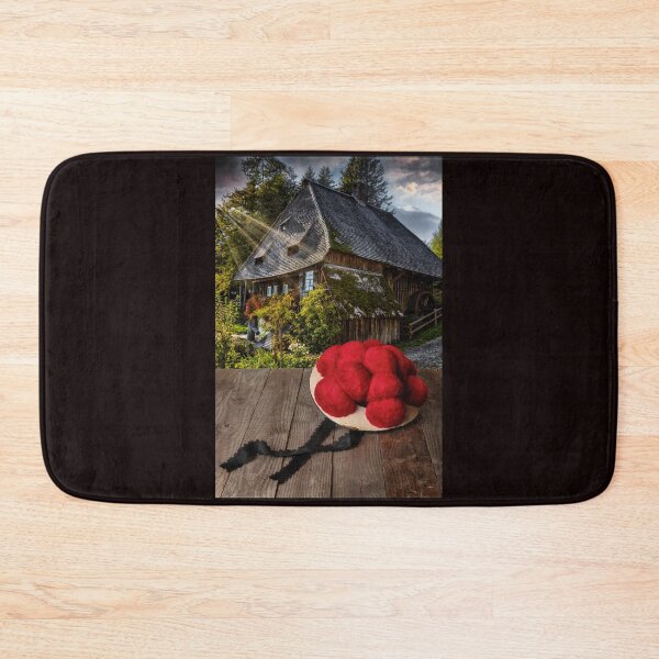 Item preview, Black Forest Bollenhut on a wooden table in front of a historic mill designed and sold by Jürgen Wiesler.