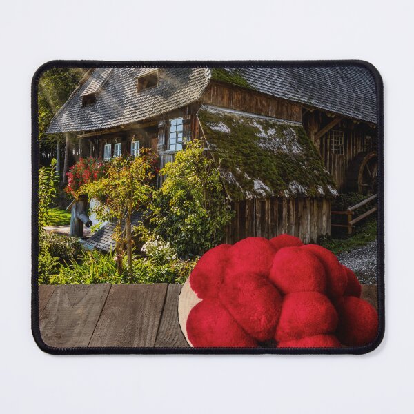 Item preview, Black Forest Bollenhut on a wooden table in front of a historic mill designed and sold by Jürgen Wiesler.