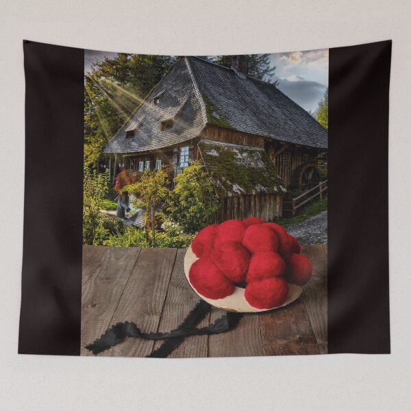 Item preview, Black Forest Bollenhut on a wooden table in front of a historic mill designed and sold by Jürgen Wiesler.
