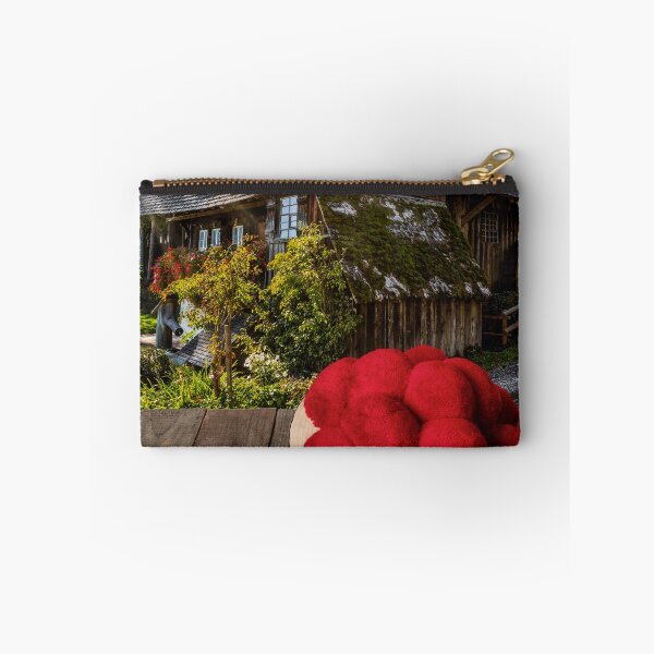 Item preview, Black Forest Bollenhut on a wooden table in front of a historic mill designed and sold by Jürgen Wiesler.