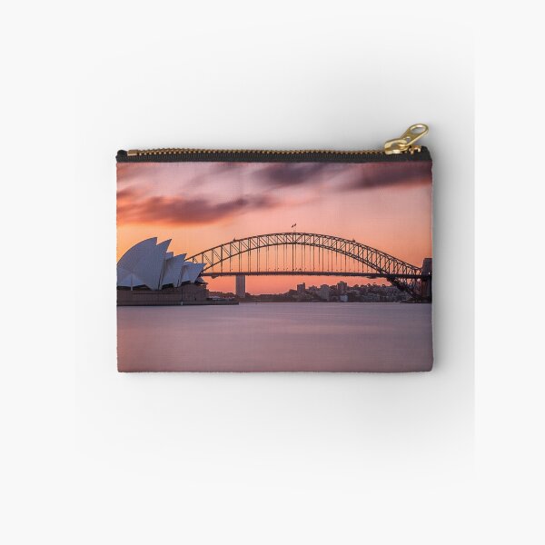 Item preview, Beautiful shot of the sydney harbor bridge with a light pink and blue sky designed and sold by klimov0101.
