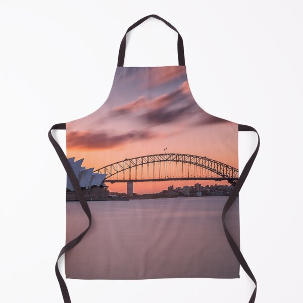 Item preview, Beautiful shot of the sydney harbor bridge with a light pink and blue sky designed and sold by klimov0101.
