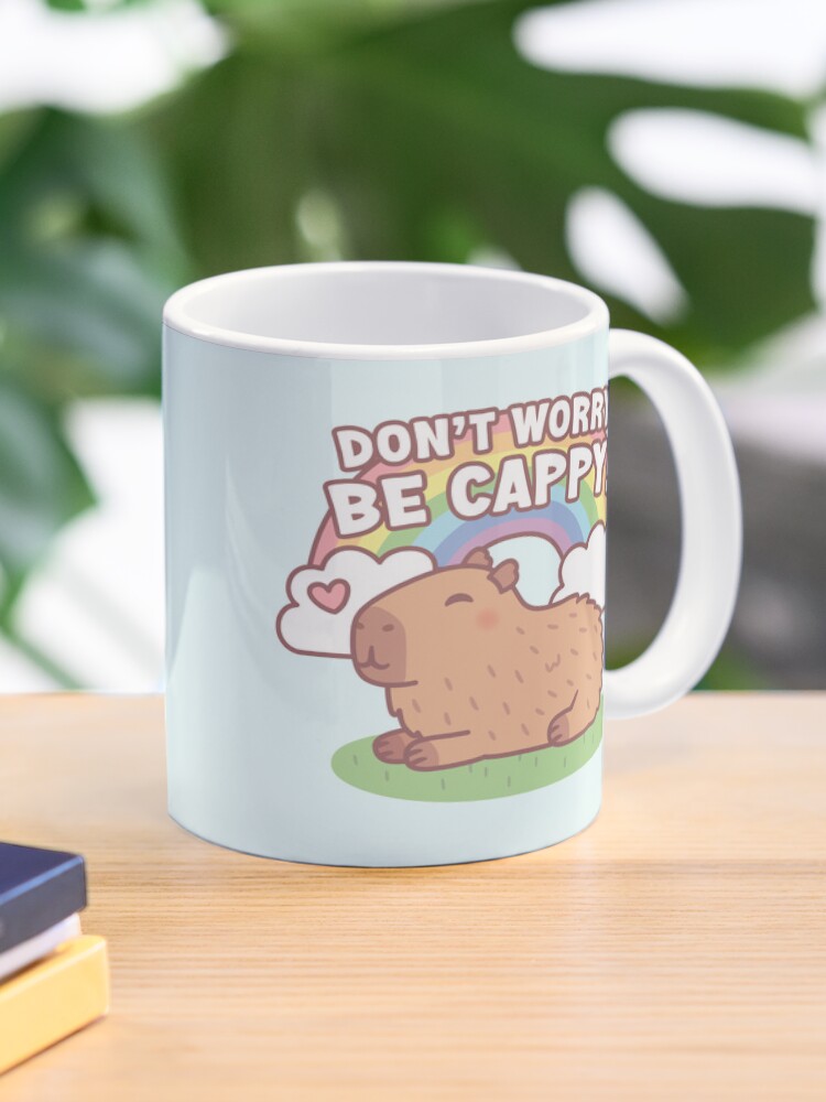Thumbnail 1 von 6, Kaffeebecher, Niedlicher Capybara und Regenbogen, mach dir keine Sorgen, sei Cappy designt und verkauft von rustydoodle.