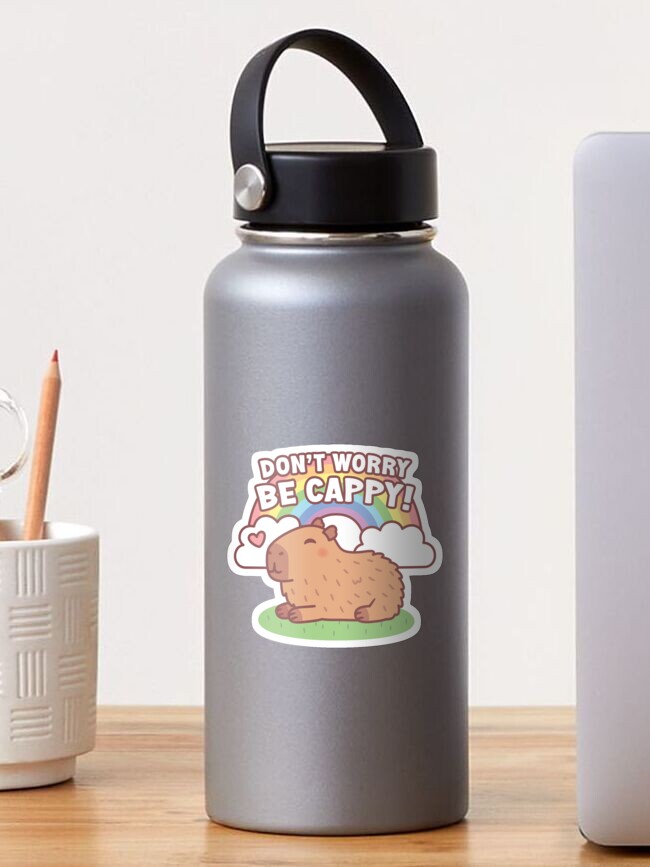Thumbnail 1 von 3, Sticker, Niedlicher Capybara und Regenbogen, mach dir keine Sorgen, sei Cappy designt und verkauft von rustydoodle.