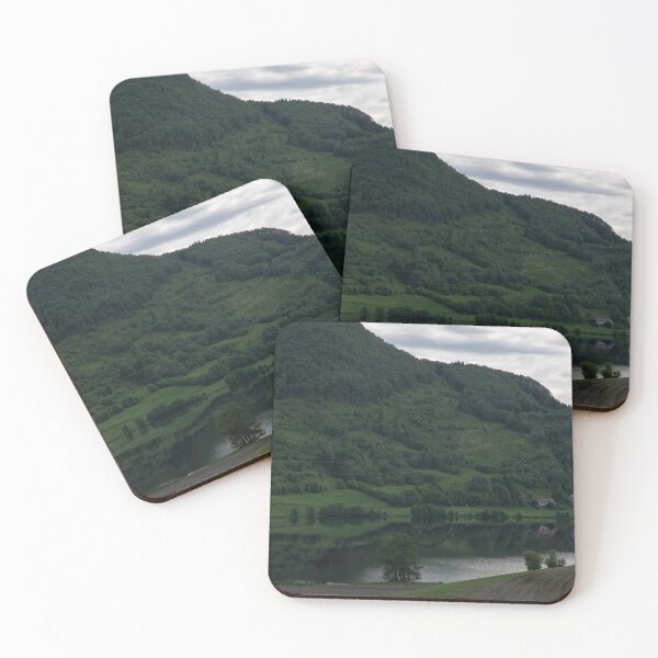 Item preview, Wonderful landscapes in Norway. Green hill with mirror reflection on the water of the lake Gjerdesdalsvatnet . Norwegian Scenic Route Ryfylke. Trees and rocks in the background. designed and sold by Maurizio Fabbroni.