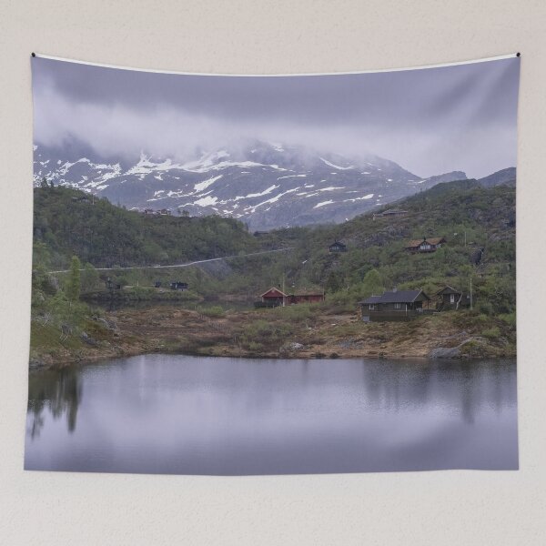 Item preview, Wonderful landscapes in Norway. Vestland. Beautiful scenery of houses with grass roof. Norwegian traditional architecture Mountains, trees and snow in background. Cloudy day designed and sold by Maurizio Fabbroni.
