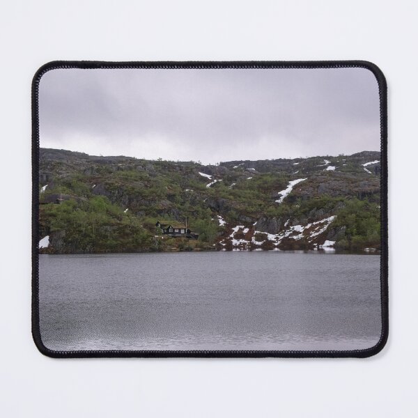 Item preview, Wonderful landscapes in Norway. Vestland. Beautiful scenery of houses with grass roof. Norwegian traditional architecture Mountains, trees and snow in background. Cloudy day designed and sold by Maurizio Fabbroni.