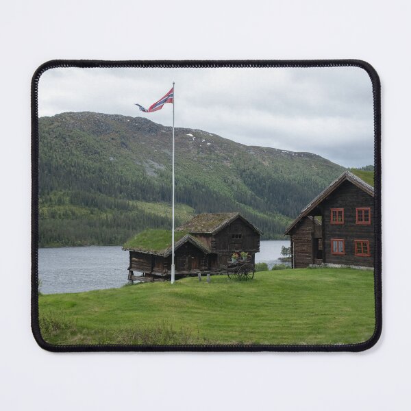 Item preview, Wonderful landscapes in Norway. Vestland. Beautiful scenery of houses with grass roof. Norwegian traditional architecture Mountains, trees and snow in background. Cloudy day designed and sold by Maurizio Fabbroni.