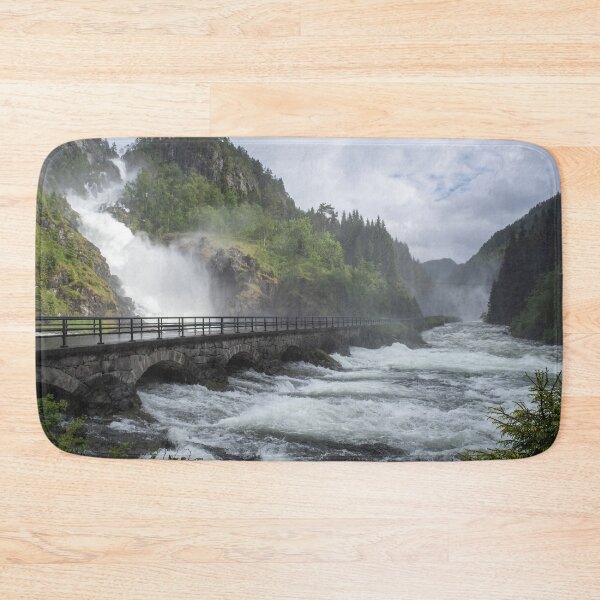 Item preview, Wonderful landscapes in Norway. Vestland. Beautiful scenery of Latefossen waterfall under the Lotevatnet lake on the Hardanger scenic route. Mountains, trees in background. Cloudy day designed and sold by Maurizio Fabbroni.