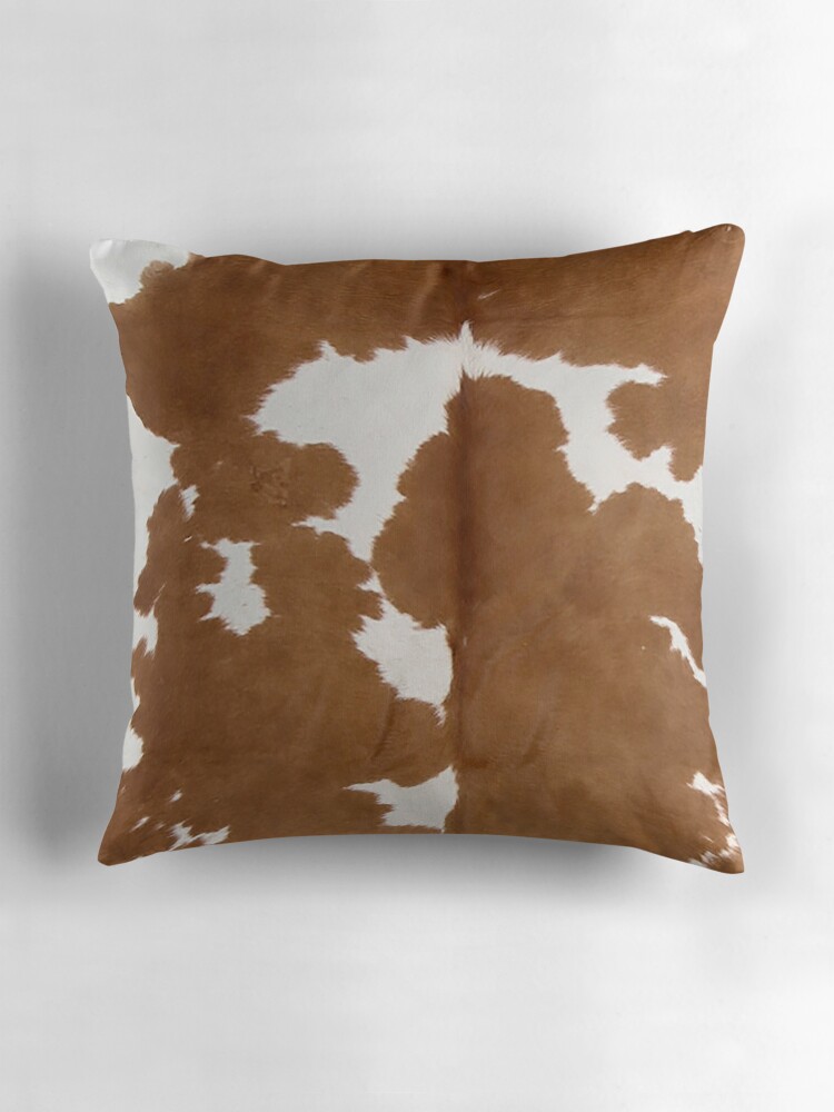 white cowhide pillow