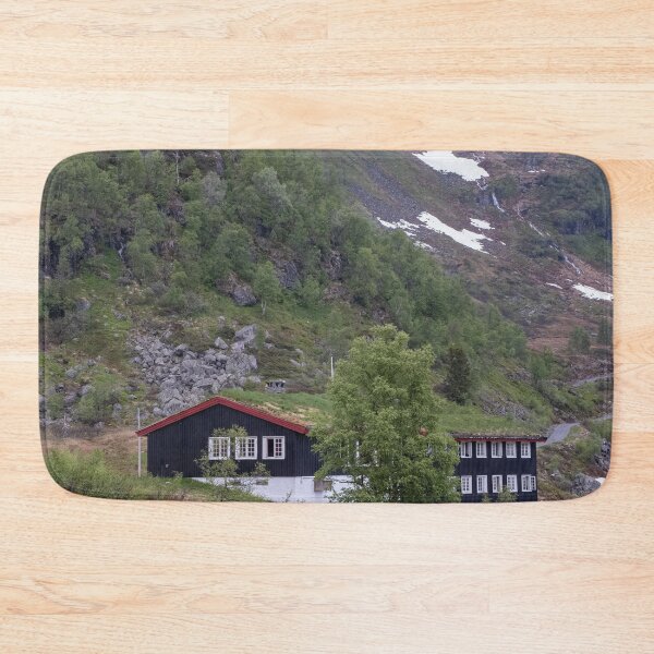 Item preview, Wonderful landscapes in Norway. Vestland. Beautiful scenery of houses with grass roof. Norwegian traditional architecture Mountains, trees and snow in background. Cloudy day (vertical) designed and sold by Maurizio Fabbroni.