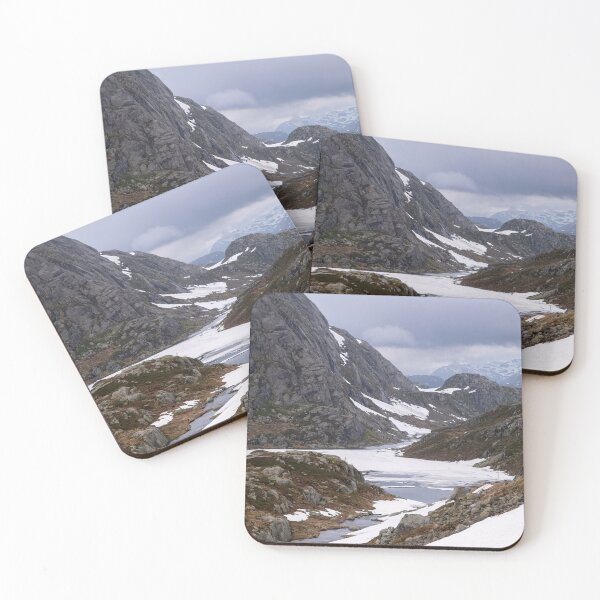 Item preview, Wonderful landscapes in Norway. Vestland. Beautiful scenery on the Ryfylke scenic route. Mountains, rocks and snow in background. Cloudy day (vertical) designed and sold by Maurizio Fabbroni.