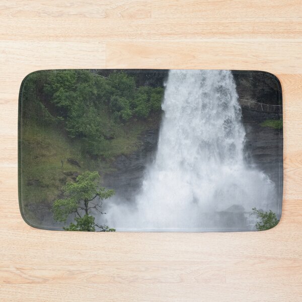 Item preview, Wonderful landscapes in Norway. Vestland. Beautiful scenery of  Steinsdalsfossen waterfall from the Fosselva river. Mountains, trees in background. Rainy day (vertical) designed and sold by Maurizio Fabbroni.