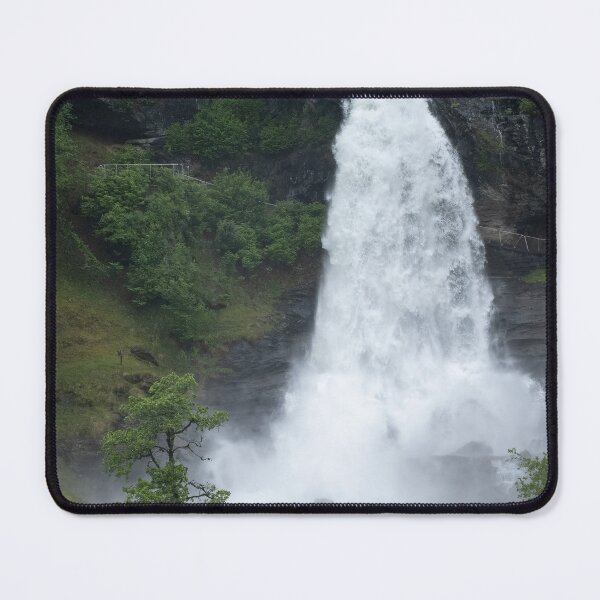 Item preview, Wonderful landscapes in Norway. Vestland. Beautiful scenery of  Steinsdalsfossen waterfall from the Fosselva river. Mountains, trees in background. Rainy day (vertical) designed and sold by Maurizio Fabbroni.