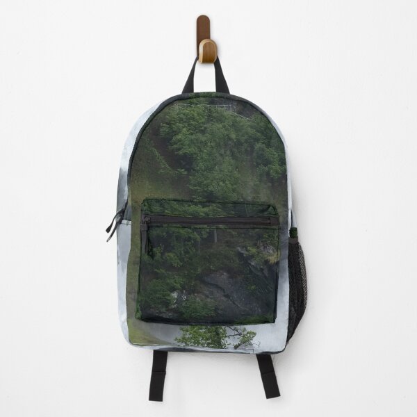 Item preview, Wonderful landscapes in Norway. Vestland. Beautiful scenery of Steinsdalsfossen waterfall from the Fosselva river. Mountains, trees in background. Rainy day (vertical) designed and sold by Maurizio Fabbroni.