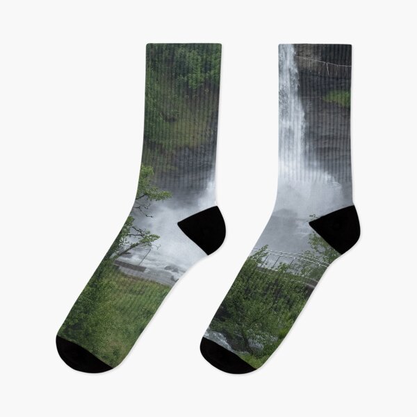 Item preview, Wonderful landscapes in Norway. Vestland. Beautiful scenery of Steinsdalsfossen waterfall from the Fosselva river. Mountains, trees in background. Rainy day (vertical) designed and sold by Maurizio Fabbroni.