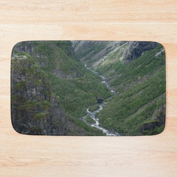 Item preview, Wonderful landscapes in Norway. Vestland. Beautiful scenery of Voringfossen waterfall in the Mabodalen valley on the Hardanger scenic route. Mountains, trees in background. Cloudy day (vertical) designed and sold by Maurizio Fabbroni.