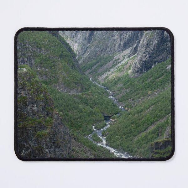 Item preview, Wonderful landscapes in Norway. Vestland. Beautiful scenery of Voringfossen waterfall in the Mabodalen valley on the Hardanger scenic route. Mountains, trees in background. Cloudy day (vertical) designed and sold by Maurizio Fabbroni.