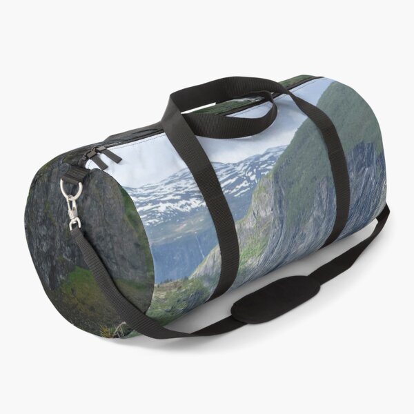 Item preview, Wonderful landscapes in Norway. Vestland. Beautiful scenery of Voringfossen waterfall in the Mabodalen valley on the Hardanger scenic route. Mountains, trees in background. Cloudy day (vertical) designed and sold by Maurizio Fabbroni.