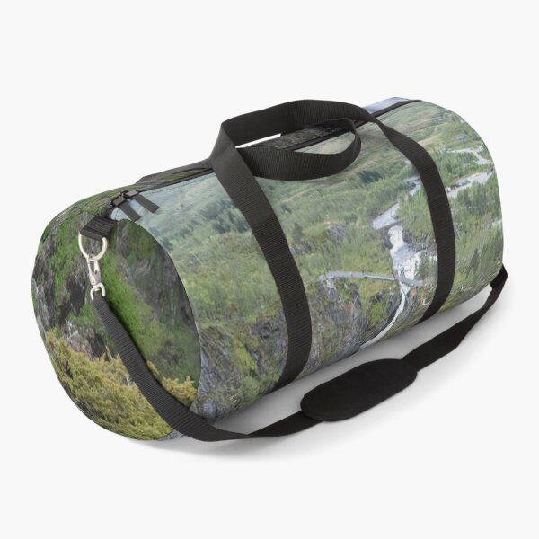 Item preview, Wonderful landscapes in Norway. Vestland. Beautiful scenery of Voringfossen waterfall in the Mabodalen valley on the Hardanger scenic route. Mountains, trees in background. Cloudy day (vertical) designed and sold by Maurizio Fabbroni.