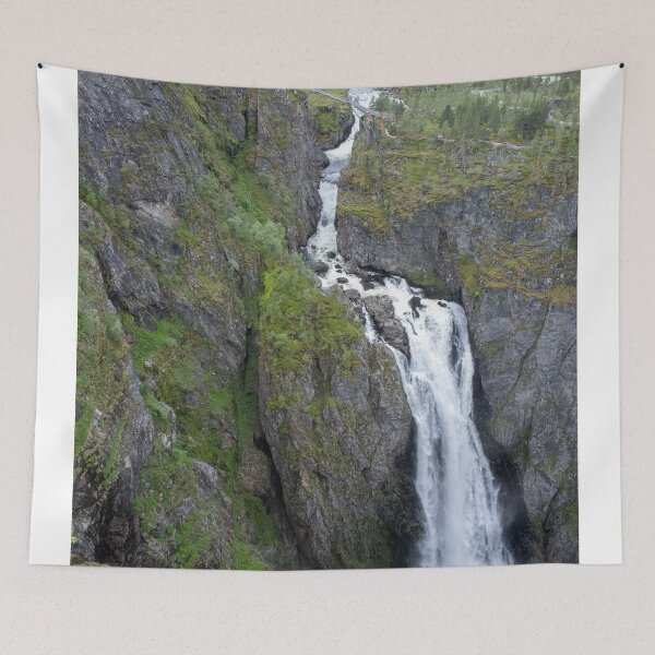 Item preview, Wonderful landscapes in Norway. Vestland. Beautiful scenery of Voringfossen waterfall in the Mabodalen valley on the Hardanger scenic route. Mountains, trees in background. Cloudy day (vertical) designed and sold by Maurizio Fabbroni.
