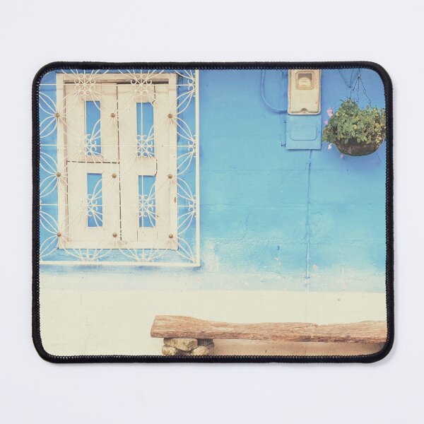 Item preview, Blue painted wall with white wrought iron window and a rustic wooden bench designed and sold by Printblisshop.