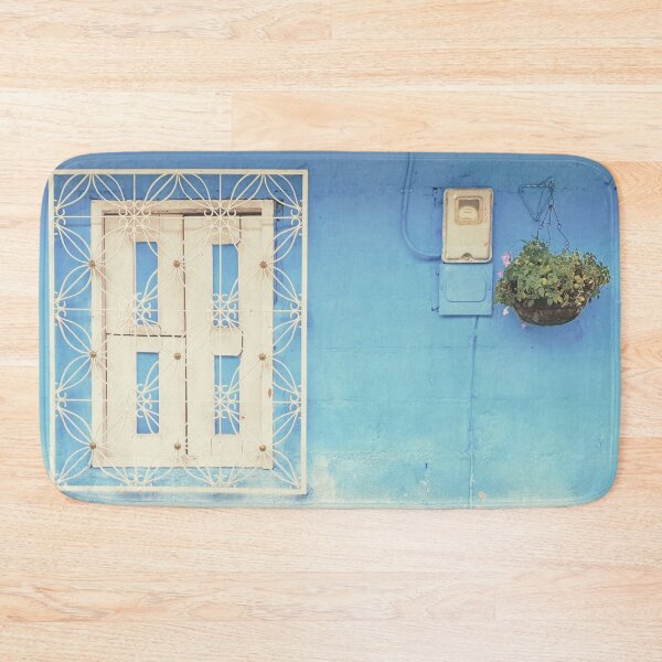 Item preview, Blue painted wall with white wrought iron window and a rustic wooden bench designed and sold by Printblisshop.