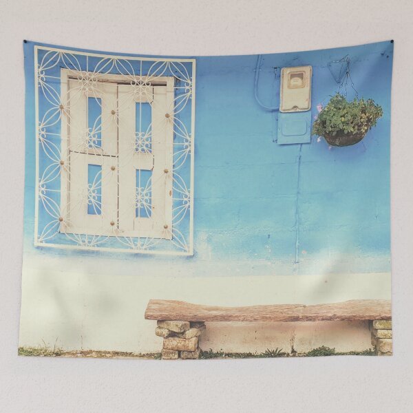 Item preview, Blue painted wall with white wrought iron window and a rustic wooden bench designed and sold by Printblisshop.