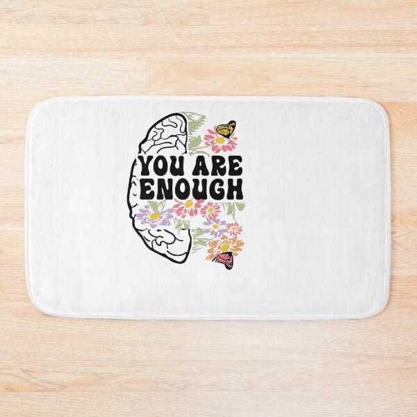 Item preview, VINTAGE AND AWESOME  FLORAL QUOTE " YOU ARE ENOUGH " MENTAL HEALTH AWARENESS ESSENTIAL TSHIRT designed and sold by GhostAmine.