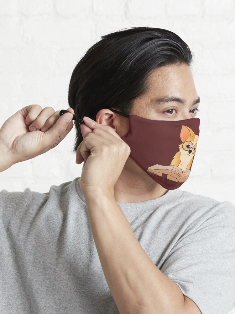 Alternate view of Corgi reads a book Mask