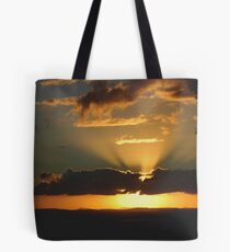 As the sun goes down Tote Bag