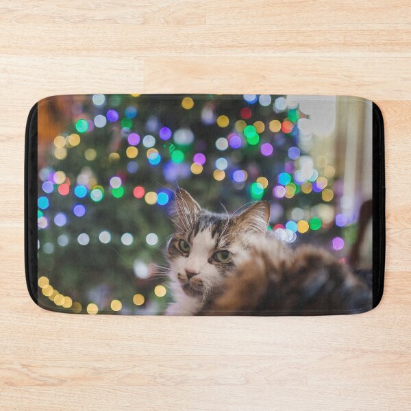 Item preview, Cat Sitting Infront Of Christmas Tree Lights Cutest Cat Pics designed and sold by CutestCatPics.