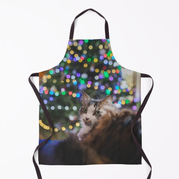 Item preview, Cat Sitting Infront Of Christmas Tree Lights Cutest Cat Pics designed and sold by CutestCatPics.