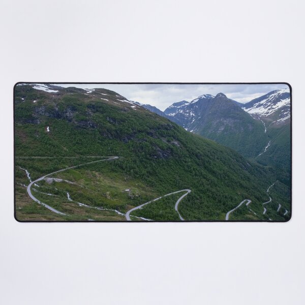 Item preview, Wonderful landscapes in Norway. Vestland. Beautiful scenery of winding roads and snowed mountains from the Gaularfjellet scenic route. Cloudy day.  designed and sold by Maurizio Fabbroni.