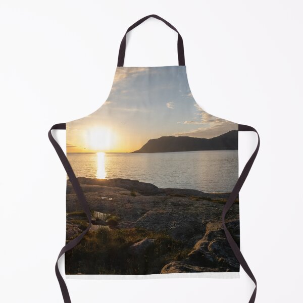 Item preview, Wonderful landscapes in Norway. Vestland. Beautiful scenery of a sunset on a calm sea in a sunny day with sunrays through the clouds and a fisherman on the shore. Yellow sky and rocks designed and sold by Maurizio Fabbroni.