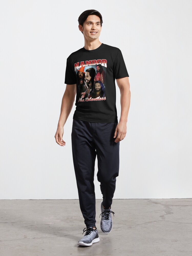 Aperçu 5 sur 7. T-shirt respirant avec l'œuvre Nandor le design implacable des années 90 créée et vendue par muschimuschi.