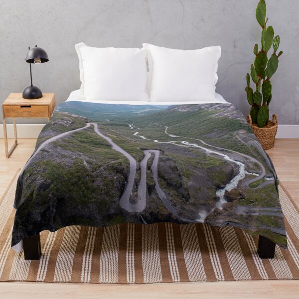Item preview, Wonderful landscapes in Norway. Vestland. Beautiful scenery of Trollstigen winding roads and valley on the Geiranger Trollstigen scenic route at midnight sun. Snowed mountains, stream designed and sold by Maurizio Fabbroni.
