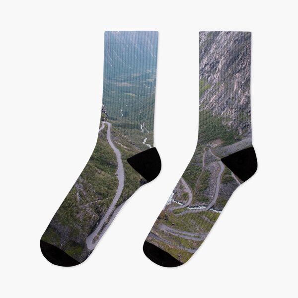 Item preview, Wonderful landscapes in Norway. Vestland. Beautiful scenery of Trollstigen winding roads and valley on the Geiranger Trollstigen scenic route at midnight sun. Snowed mountains, stream designed and sold by Maurizio Fabbroni.