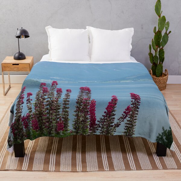 Item preview, Wonderful landscapes in Norway. Vestland. Beautiful scenery of Romsdal Fjord from the Torvikeidet village. Nice flower composition in foreground. Snowed mountains Summer cloudy day (vertical) designed and sold by Maurizio Fabbroni.