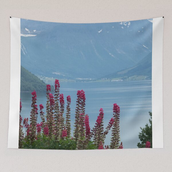Item preview, Wonderful landscapes in Norway. Vestland. Beautiful scenery of Romsdal Fjord from the Torvikeidet village. Nice flower composition in foreground. Snowed mountains Summer cloudy day (vertical) designed and sold by Maurizio Fabbroni.