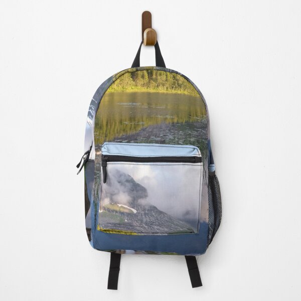Item preview, Wonderful landscapes in Norway. Nordland. Beautiful scenery of Thaihuset in a mountain valley. It is idyllically situated by a calm water. Mountains and trees in background. Sunset. designed and sold by Maurizio Fabbroni.
