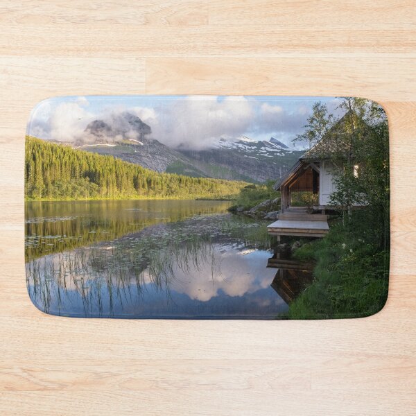 Item preview, Wonderful landscapes in Norway. Nordland. Beautiful scenery of Thaihuset in a mountain valley. It is idyllically situated by a calm water. Mountains and trees in background. Sunset. designed and sold by Maurizio Fabbroni.