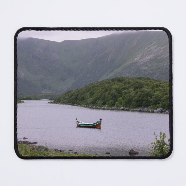 Item preview, Wonderful landscapes in Norway. Nordland. Beautiful scenery of a valley with a picturesque boat in the Storvatnet lake. Rippled water in a cloudy summer day designed and sold by Maurizio Fabbroni.