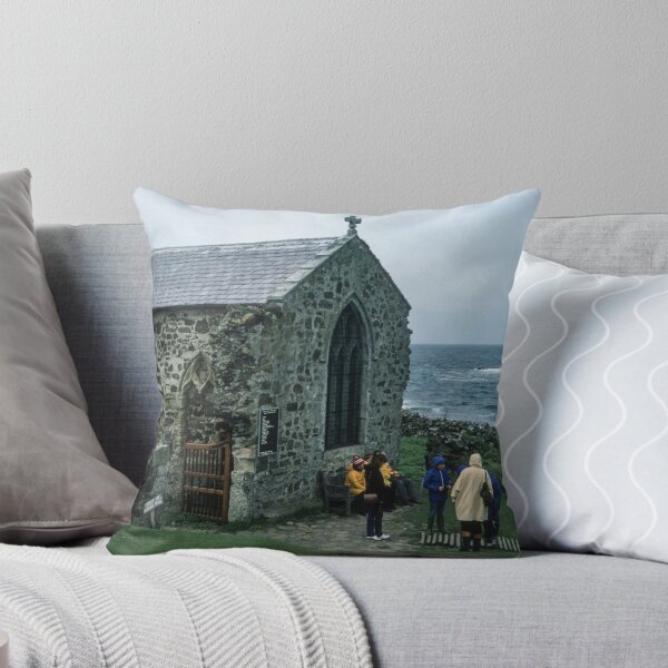Item preview, People outside 1370 church in memory of St Cuthbert who died here 687 on Farne island off Sea Houses Bamburgh Northumberland England 19840528 0019m designed and sold by Fred Mitchell.